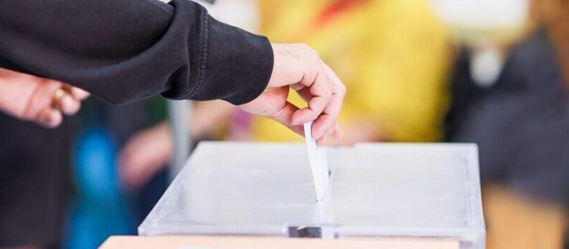 political referendum polling choice voter background with copy space. democratic system. Hispanic voter holding an envelope in an electoral college